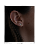 Martine Mixed Studs worn on a model's ear, solid 18k white and yellow gold mixed-metal stud earrings. Tarnish-resistant and made for everyday wear — Maya & Mason handcrafted fine jewellery.